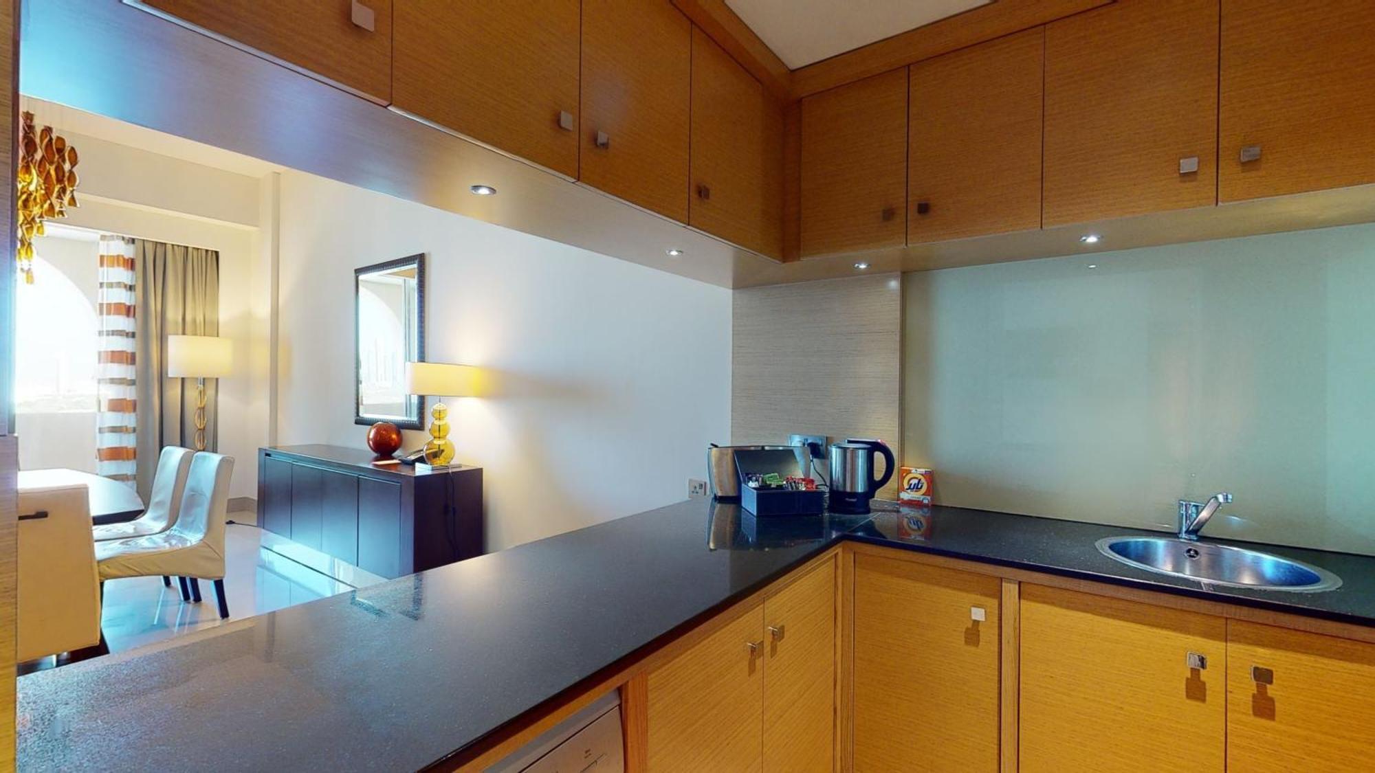 Marriott Executive Apartments Al Jaddaf, Dubai Cameră foto A typical kitchen in a serviced apartment
